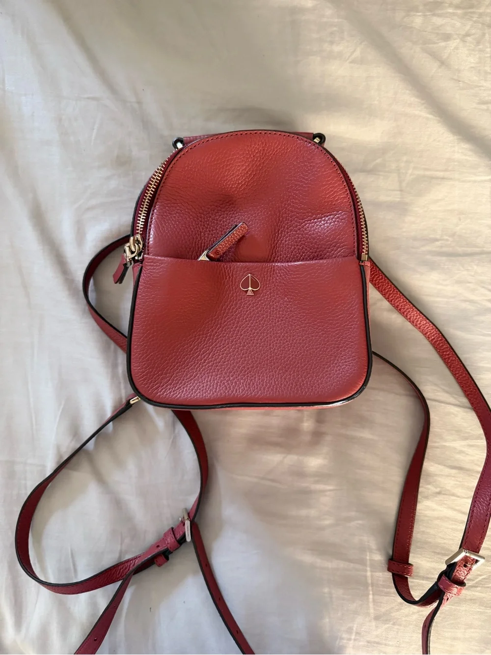 kate spade pebble leather red mini backpack